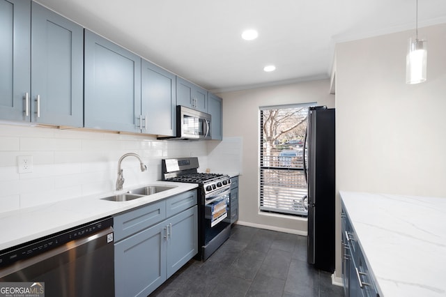 kitchen with stainless steel appliances, a sink, decorative backsplash, and light stone countertops