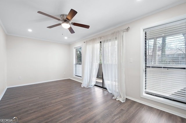 empty room featuring ceiling fan, recessed lighting, dark wood-type flooring, baseboards, and ornamental molding