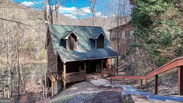 chalet / cabin with a porch