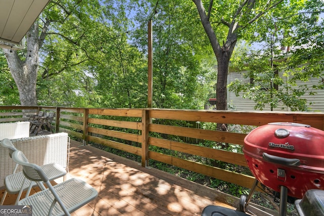 wooden deck with area for grilling