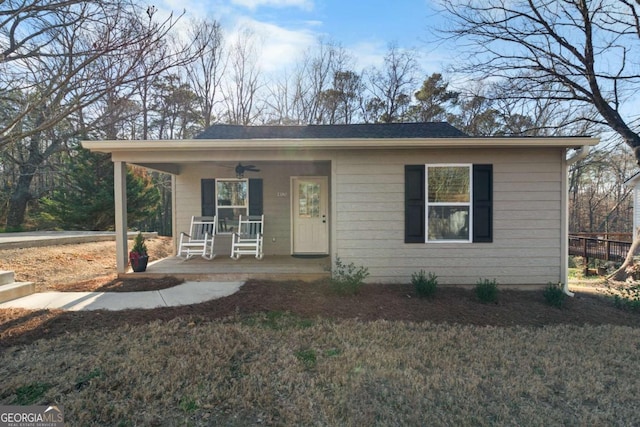 view of front of home with a porch and a ceiling fan