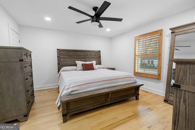 bedroom with light wood-style flooring, baseboards, a ceiling fan, and recessed lighting