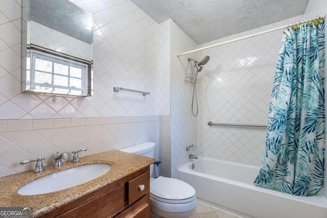 full bath featuring a textured ceiling, toilet, tile walls, tile patterned floors, and shower / bath combo with shower curtain