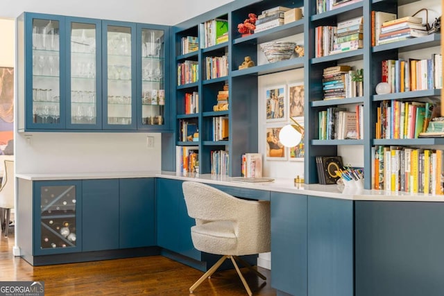 office space featuring wood finished floors