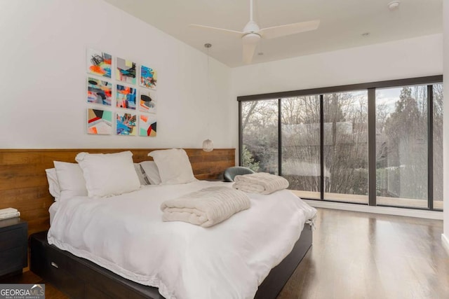 bedroom featuring wood finished floors