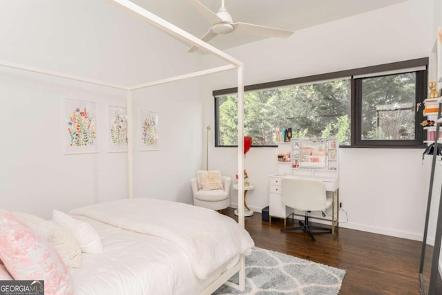 bedroom featuring a ceiling fan, baseboards, and wood finished floors