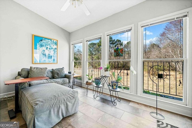 bedroom with vaulted ceiling and baseboards