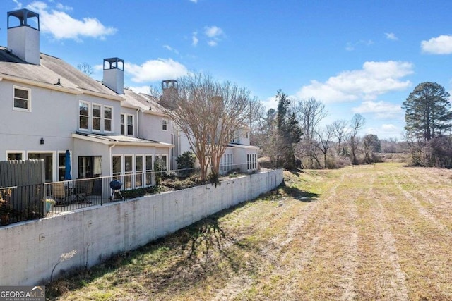 view of yard featuring fence