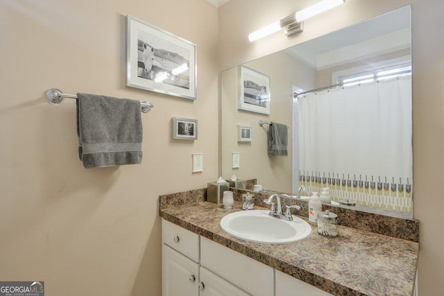 bathroom with a shower with curtain and vanity