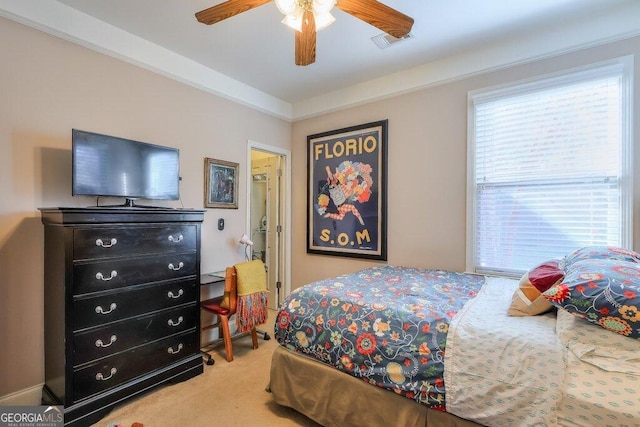 bedroom featuring carpet floors, visible vents, and ceiling fan