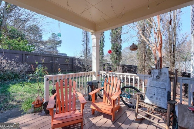 deck featuring fence private yard