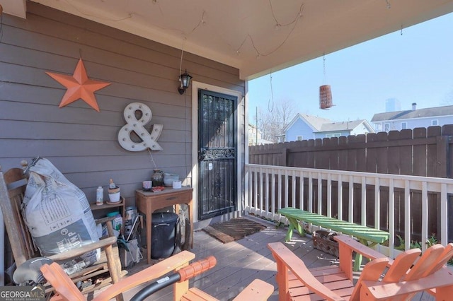 view of patio / terrace featuring fence