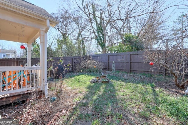 view of yard featuring a fenced backyard