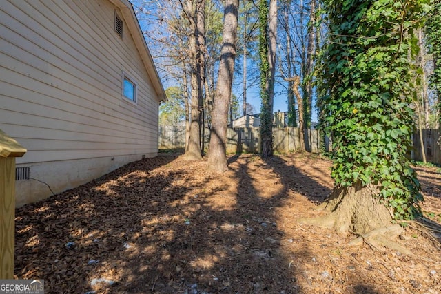 view of yard with fence