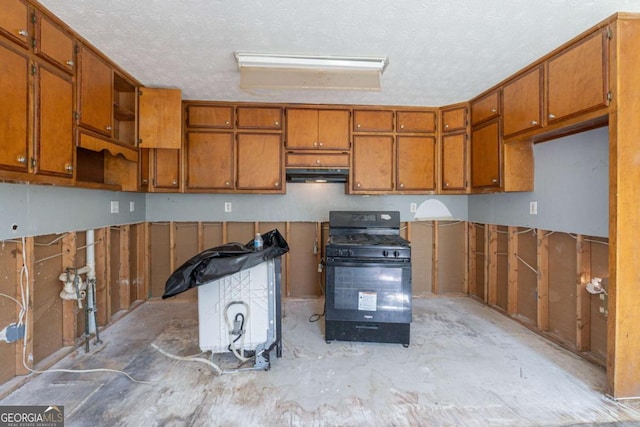 kitchen featuring open shelves, brown cabinetry, black range with gas stovetop, and under cabinet range hood