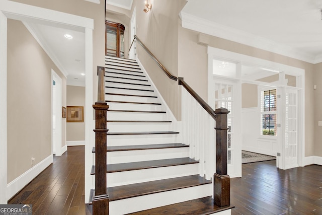 stairway with wood-type flooring, baseboards, crown molding, and recessed lighting