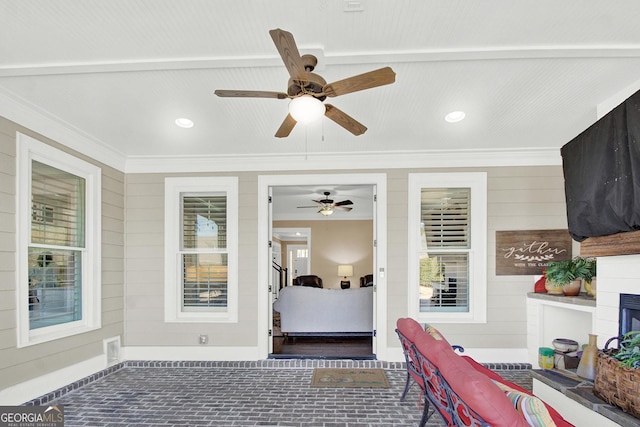 interior space featuring an outdoor fireplace