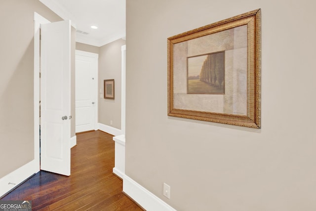 hallway with dark wood-style floors, recessed lighting, and baseboards