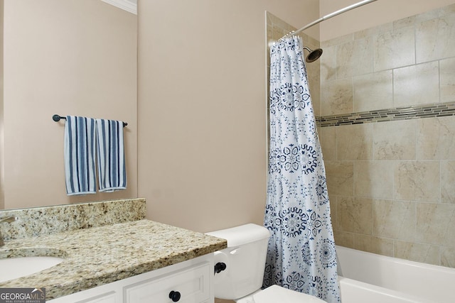 bathroom with toilet, shower / bath combo with shower curtain, and vanity