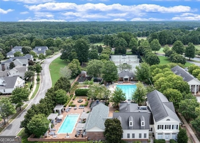 drone / aerial view with a view of trees