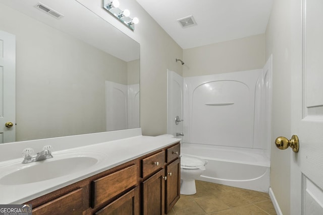 bathroom with tile patterned flooring, toilet, vanity, visible vents, and shower / washtub combination