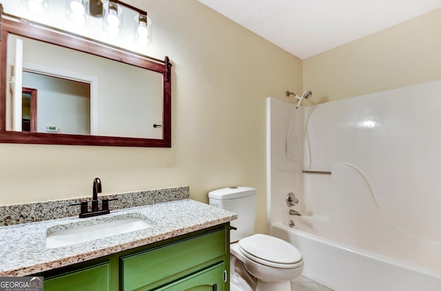 full bathroom featuring toilet, tile patterned floors, tub / shower combination, and vanity