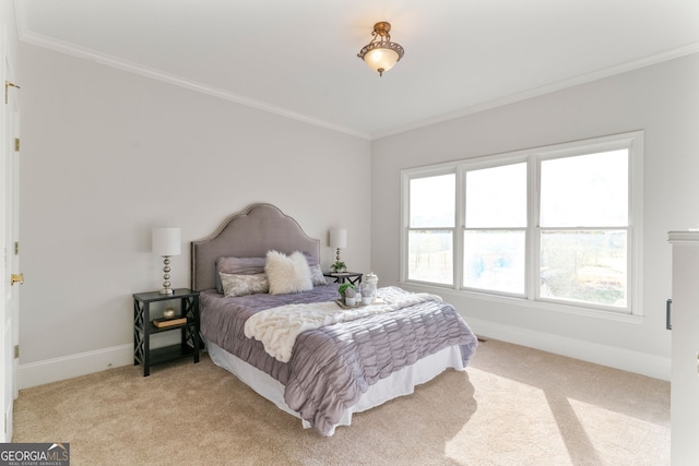 bedroom featuring light carpet, baseboards, and crown molding