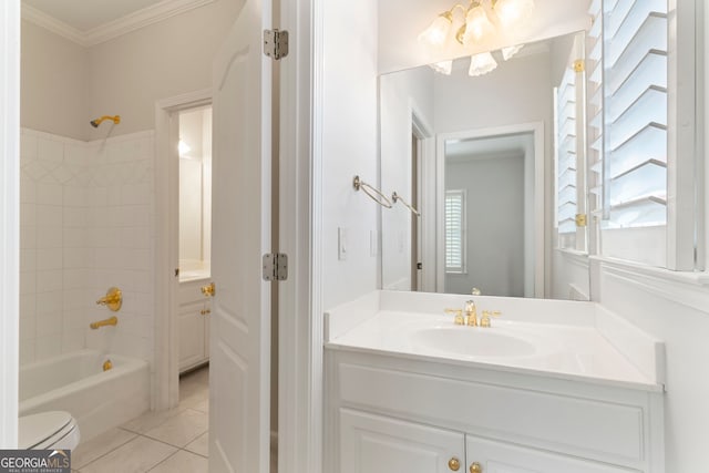 bathroom with shower / washtub combination, crown molding, toilet, vanity, and tile patterned floors