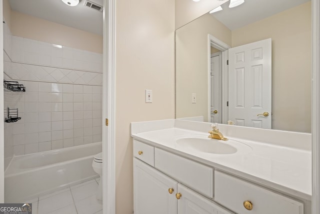 bathroom featuring visible vents, toilet, shower / tub combination, tile patterned flooring, and vanity