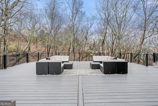 wooden deck with an outdoor hangout area