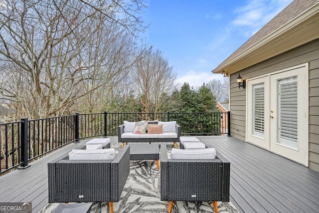 wooden deck with outdoor lounge area