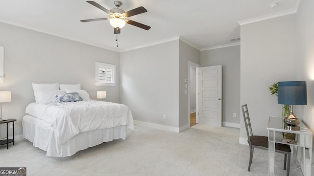 bedroom with ornamental molding, carpet flooring, visible vents, and baseboards