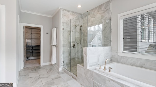 bathroom with ornamental molding, a garden tub, marble finish floor, a walk in closet, and a shower stall