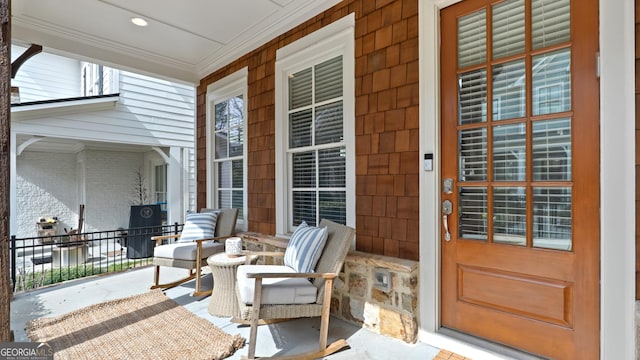 property entrance with covered porch