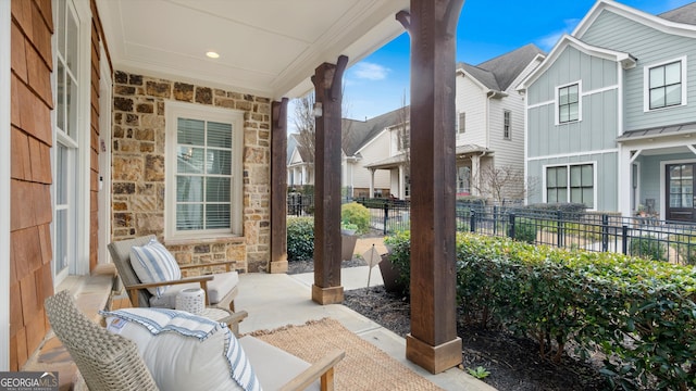 view of patio / terrace featuring fence