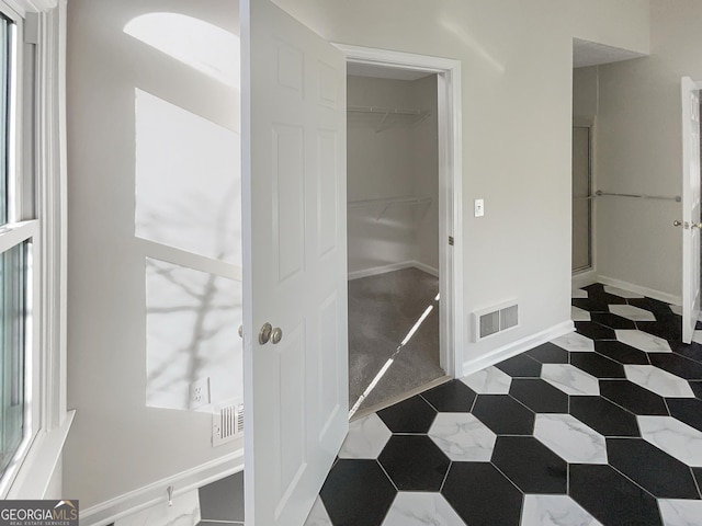 closet featuring visible vents