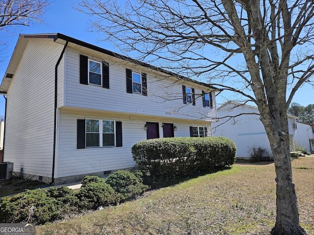 view of front of property featuring crawl space and central AC