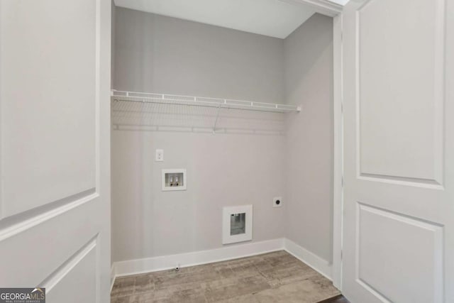 laundry room with laundry area, baseboards, wood finished floors, washer hookup, and electric dryer hookup