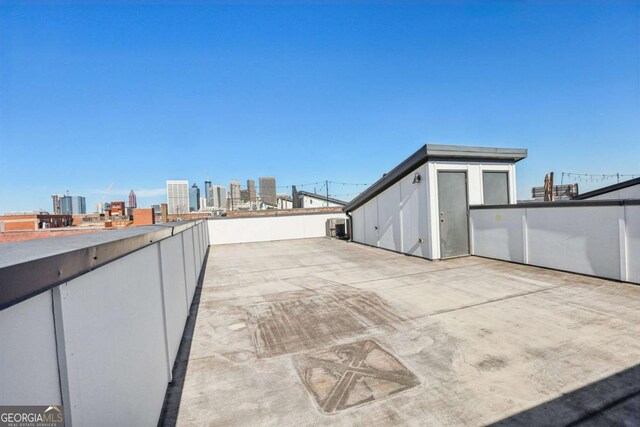 view of patio with a city view