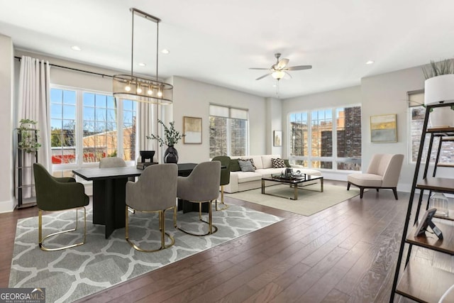 dining room with ceiling fan, hardwood / wood-style floors, and recessed lighting