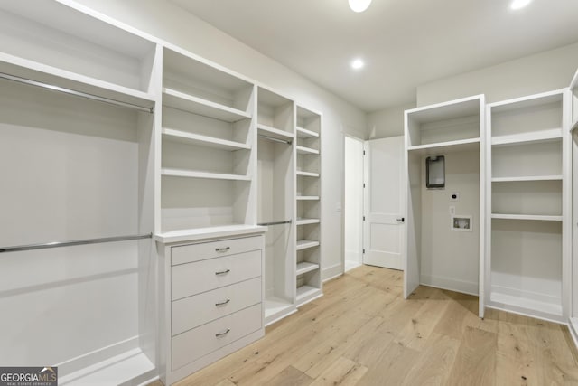 372 Karen Dr, Alpharetta, GA 30009 - walk in closet featuring light wood-style floors