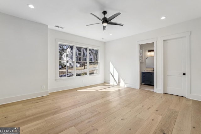 372 Karen Dr, Alpharetta, GA 30009 - unfurnished living room with light wood-type flooring, ceiling fan, recessed lighting, and baseboards