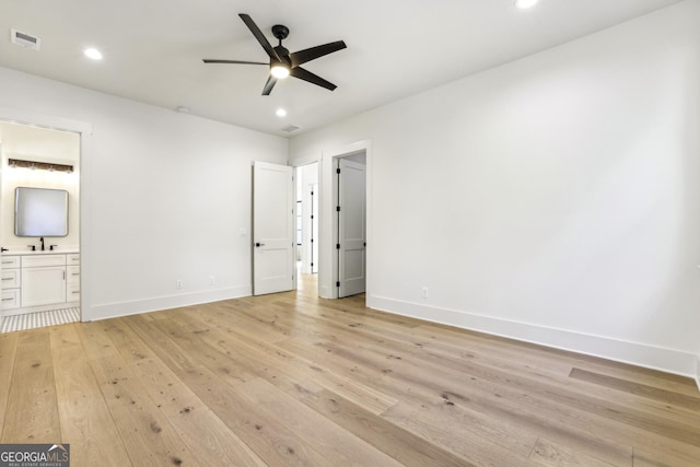 unfurnished bedroom with light wood-type flooring, baseboards, visible vents, and recessed lighting