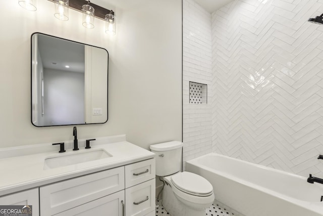 bathroom with shower / washtub combination, vanity, and toilet