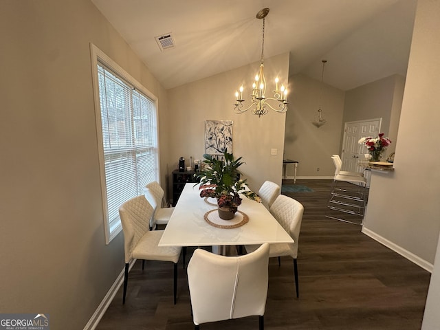 dining space featuring lofted ceiling, baseboards, visible vents, and dark wood finished floors