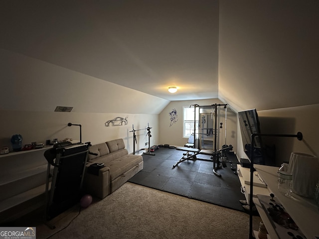 workout room featuring lofted ceiling