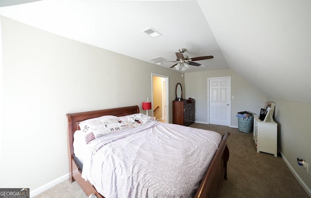 carpeted bedroom with lofted ceiling, ceiling fan, visible vents, and baseboards