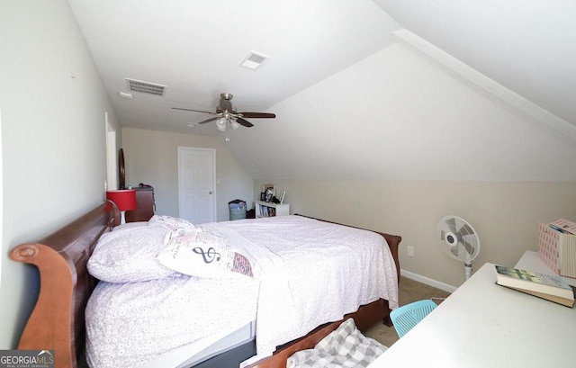 bedroom featuring visible vents, vaulted ceiling, a ceiling fan, and carpet flooring