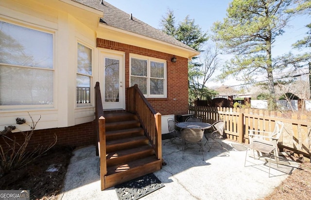 view of patio / terrace featuring outdoor dining space and fence