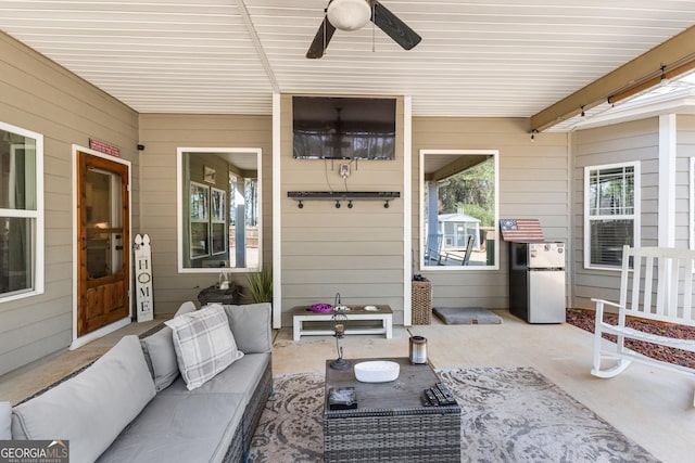 view of patio / terrace featuring a ceiling fan and outdoor lounge area